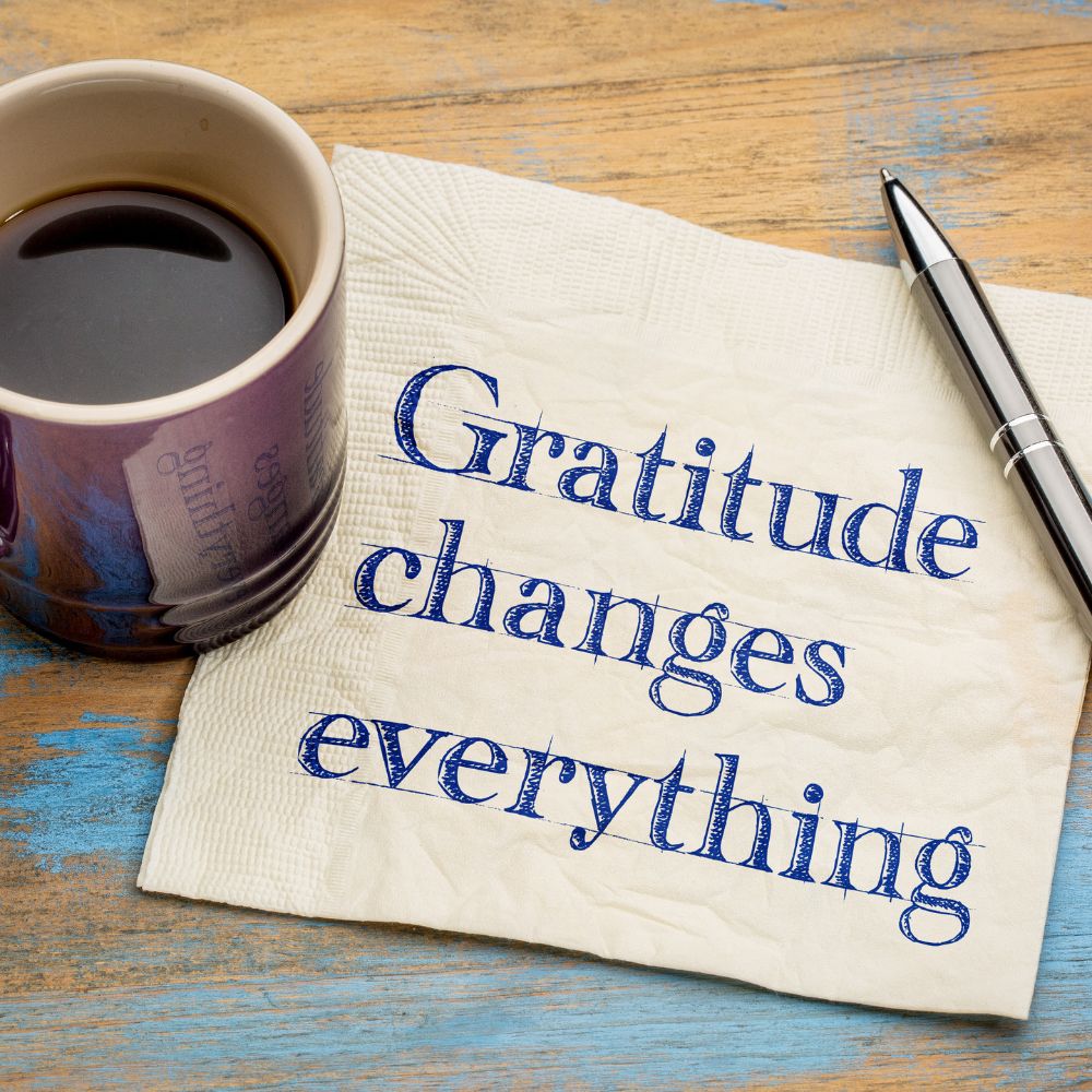 Dankbarkeit ändert alles Dankbarkeit verändert alles – Serviette mit Aufschrift „Gratitude changes everything"